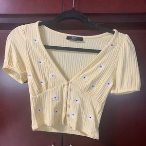 Yellow crop top with flowers